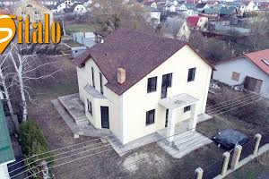 будинок за адресою 12-абрикосова, 1