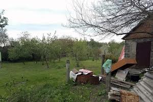 участок по адресу Мельниківська