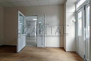 комерційна за адресою Миколи Міхновського бульв. (Дружби Народів), 14-16