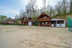 комерційна за адресою Шкільна вул., 24а