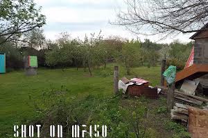 ділянка за адресою Мельниківська