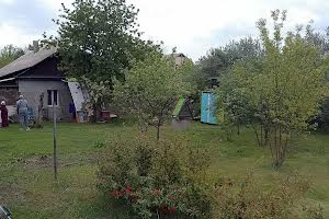 участок по адресу Мельниківська