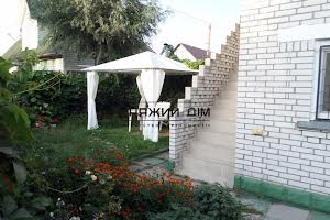 будинок за адресою смт. Козин, Дамба