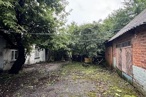 ділянка за адресою с. Музичі, провулок Садовий, 1