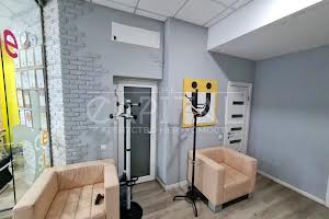 комерційна за адресою Дмитрівська вул., 80