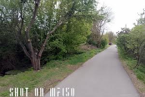 ділянка за адресою Мельниківська