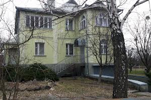 будинок за адресою с. Рославичі, Шевченно