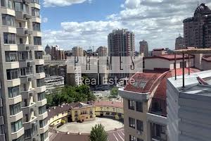 комерційна за адресою Євгена Коновальця вул. (Щорса), 32-А