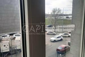 комерційна за адресою Дніпровська набережна вул., 1