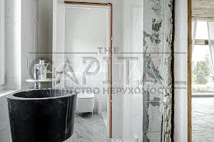 будинок за адресою с. Безуглівка, Миру