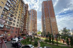 комерційна за адресою Євгена Коновальця вул. (Щорса), 32-Б