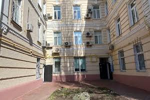 комерційна за адресою Трьохсвятительська вул., 13