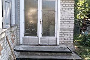 будинок за адресою смт. Вільшани, Садова, 12