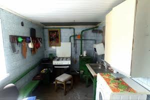 будинок за адресою с. Власівка, Вереснева, 12