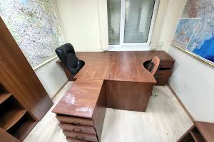 комерційна за адресою Микільсько-Слобідська вул., 2-Б