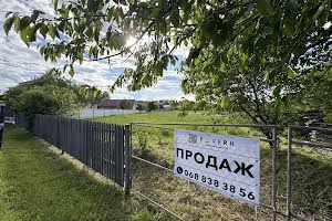участок по адресу Л.Українки