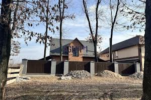 будинок за адресою с. Крюківщина, Захисна