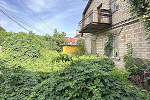 дом по адресу Жовтнева, 33А