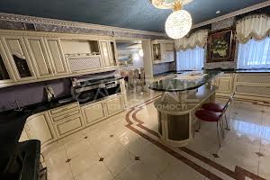 комерційна за адресою Євгена Чикаленка вул. (Пушкінська), 32В