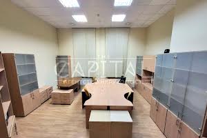 комерційна за адресою Микільсько-Слобідська вул., 2-Б