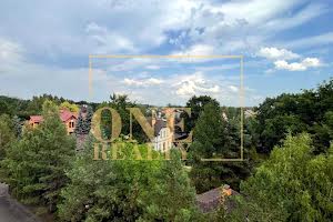 будинок за адресою смт. Козин, Лісова вул.