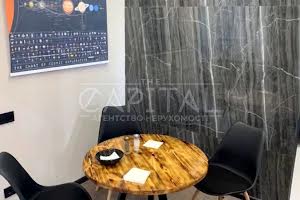 комерційна за адресою Євгена Коновальця вул. (Щорса), 44-А