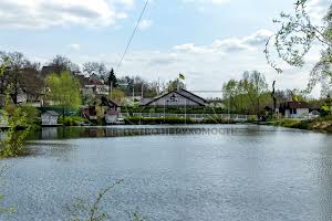 комерційна за адресою Шкільна вул., 24а