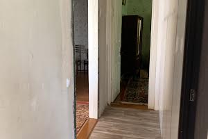 будинок за адресою смт. Пісочин, Новоолешківська вул.