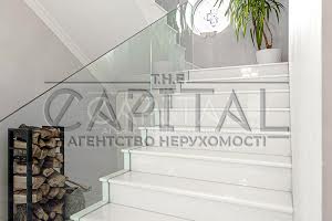 будинок за адресою с. Безуглівка, Миру