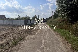 ділянка за адресою с. Таценки, 