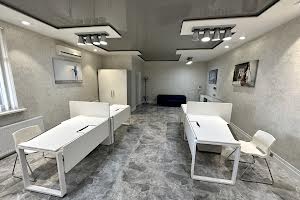 комерційна за адресою Євгена Коновальця вул. (Щорса), 32-Б