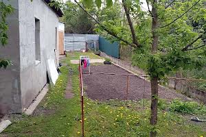 ділянка за адресою Мельниківська