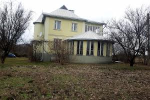 будинок за адресою с. Рославичі, Шевченно