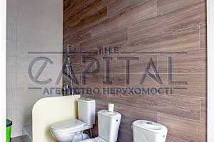 комерційна за адресою Метрологічна вул., 56