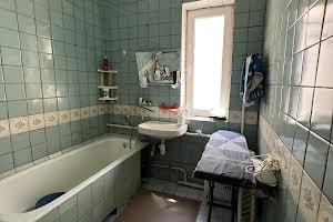 будинок за адресою Романа Шухевича вул.