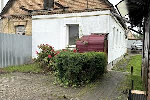ділянка за адресою Центральна вул., 14