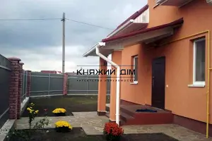 будинок за адресою с. Щасливе, провулок Орипея/ вул. Л.Українки, 1