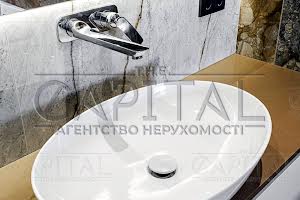 будинок за адресою с. Козин, Олександрівська вул.