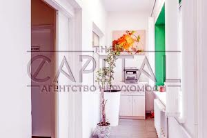 комерційна за адресою Шовковична вул., 34