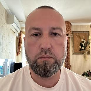 Михайло