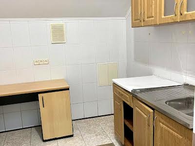 комерційна за адресою Бульварно-Кудрявська вул. (Воровського), 8б