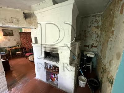 будинок за адресою с. Літки, Каштанова вулиця, 1