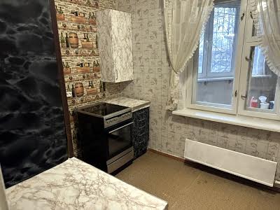 квартира за адресою Ревуцького вул., 18