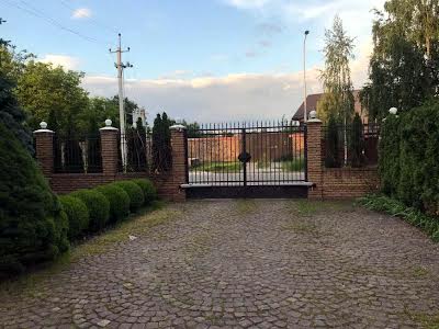 будинок за адресою смт. Козин, Лугова вул., 95