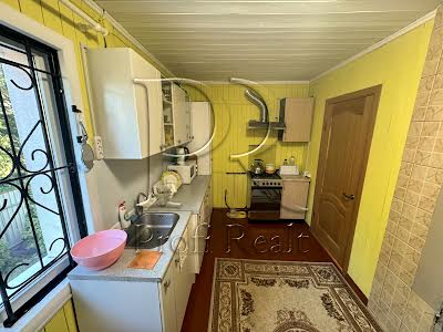 будинок за адресою с. Рожни, Південна вулиця, 74