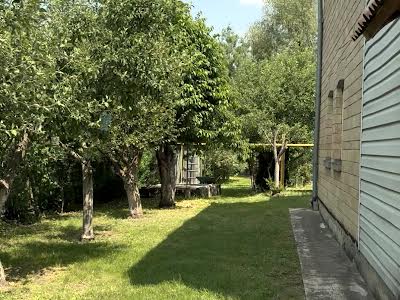 будинок за адресою с. Нові Безрадичі, Садова, 99