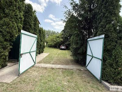 будинок за адресою с. Нові Безрадичі, Садова, 99