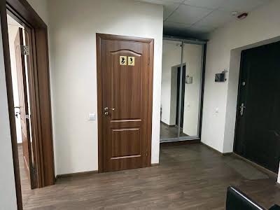 комерційна за адресою Воскресенська вул., 14е