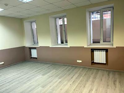 комерційна за адресою Бульварно-Кудрявська вул. (Воровського), 8б