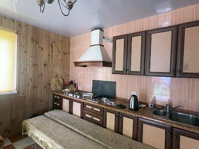 будинок за адресою Будівельників, 125